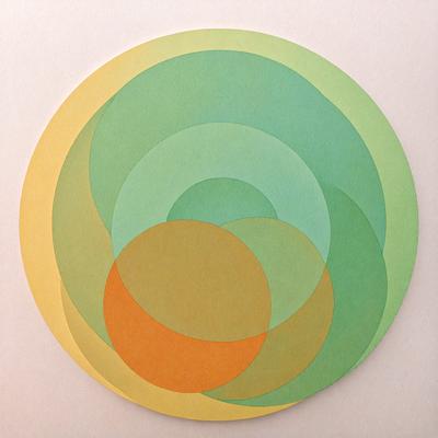 The primary subject of the image is a circle with a green, yellow, and orange background. The circle is divided into three sections, each with a different color. The setting is a white background, and the visual style appears to be a combination of digital art and illustration. The colors and mood of the image are vibrant and lively, with the green, yellow, and orange hues creating a sense of warmth and energy.